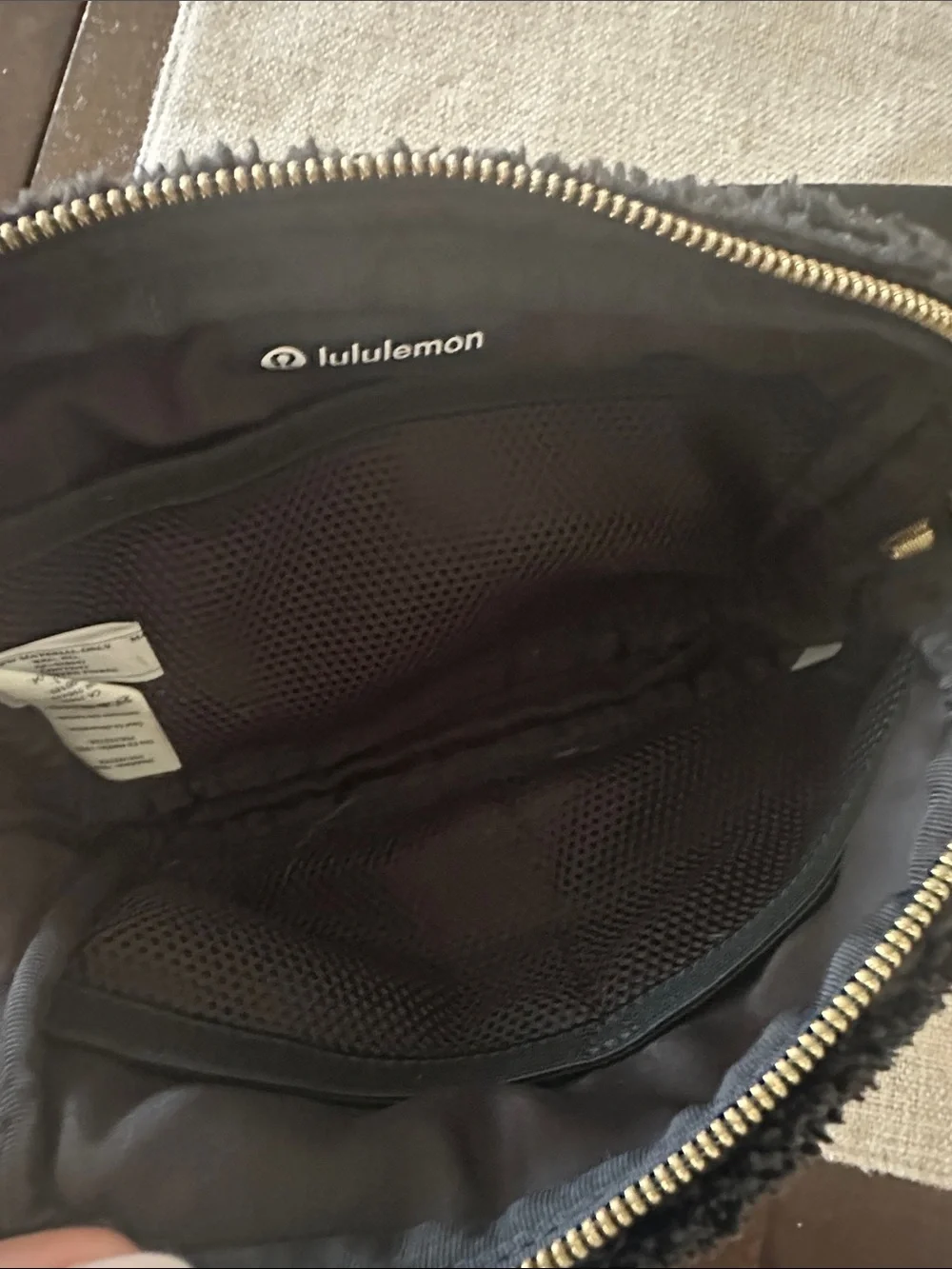 lululemon athletica Black Sherpa Belt Bag with Gold Hardware
